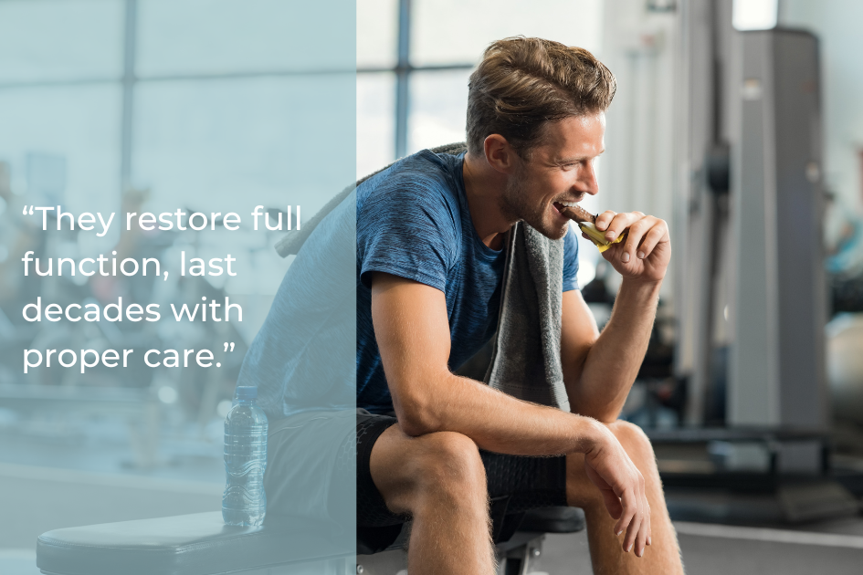 Man in athletic wear sits on a gym bench eating a sandwich, with a towel around his neck and a water bottle nearby. Text overlay highlights restoration and longevity with dental implants—a permanent solution for missing teeth.
